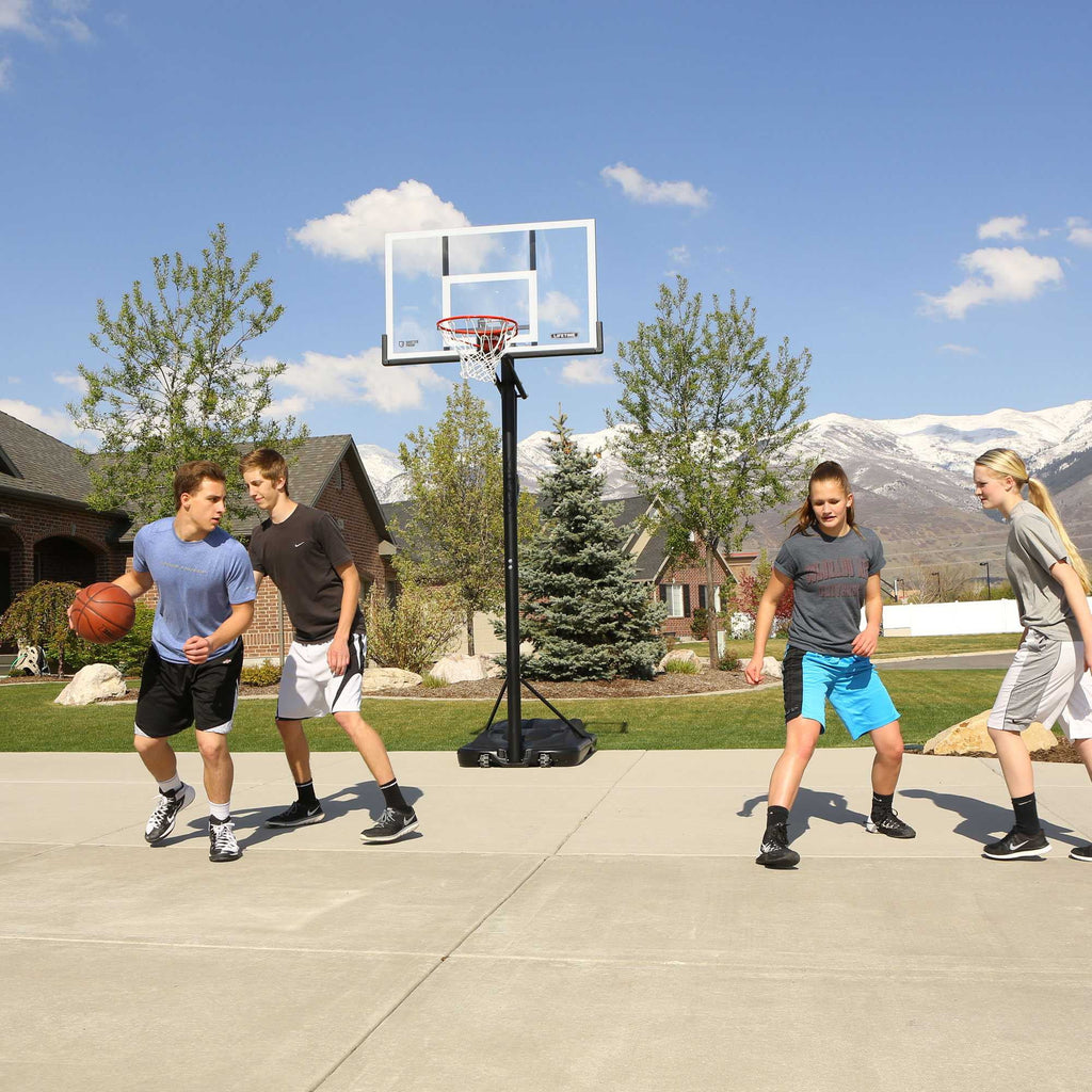 Lifetime 7.5ft. - 10ft. Adjustable Height 54 inch Steel-Framed Shatterproof Outdoor Portable Basketball System (90631)