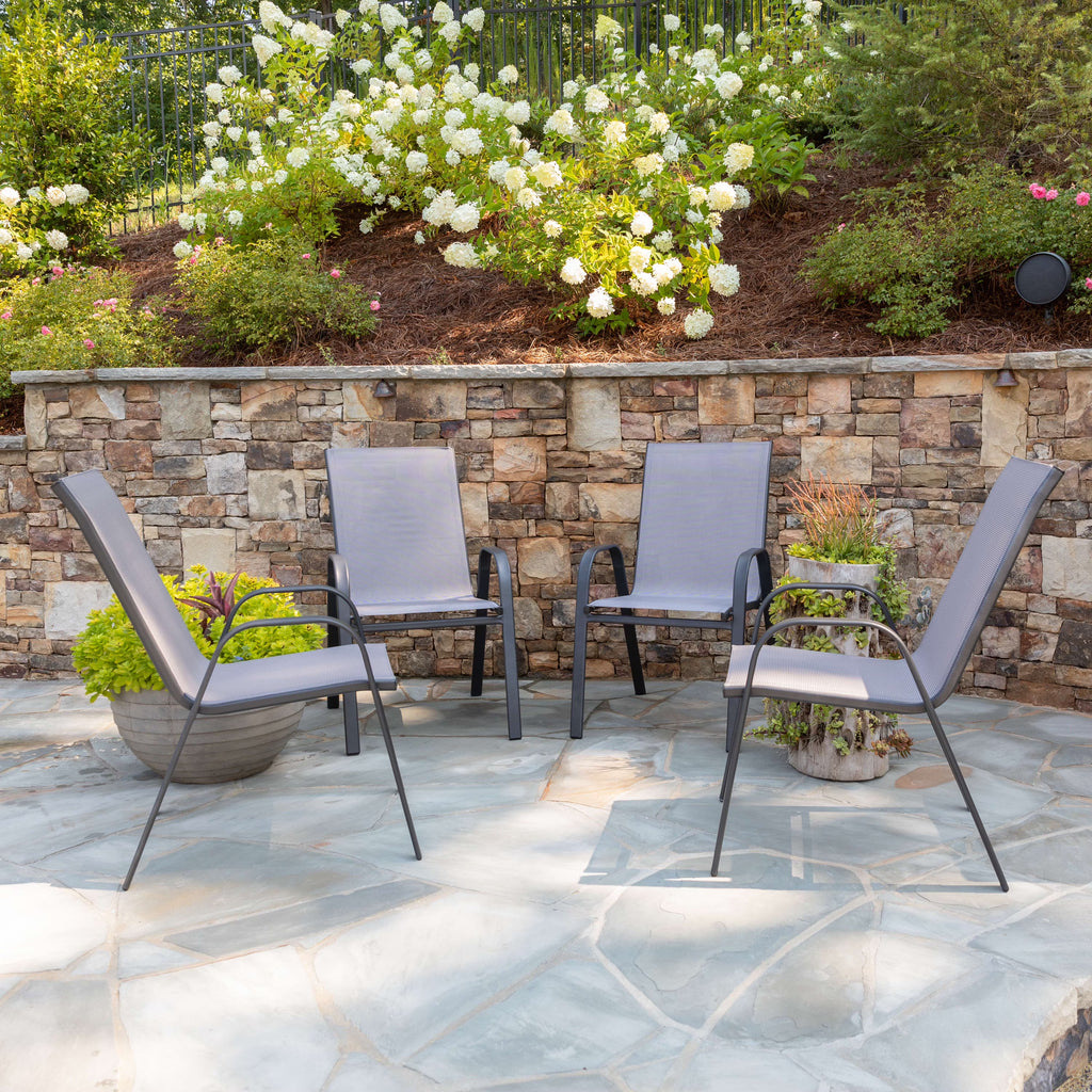 Emma + Oliver 4 Pack Gray Outdoor Stack Chair with Flex Comfort Material - Patio Stack Chair