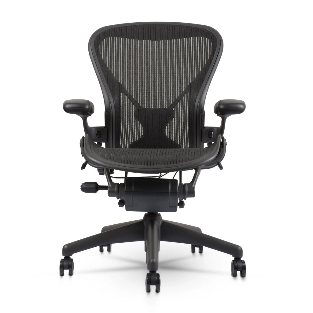 Herman Miller Aeron Chair Size B (𝙍𝙚𝙛𝙪𝙧𝙗𝙞𝙨𝙝𝙚𝙙) �?Fully Loaded PostureFit Clip‑Latch Adjustable Arms and 12‑Year Warranty along with 3 Yr Mechanical Warranty